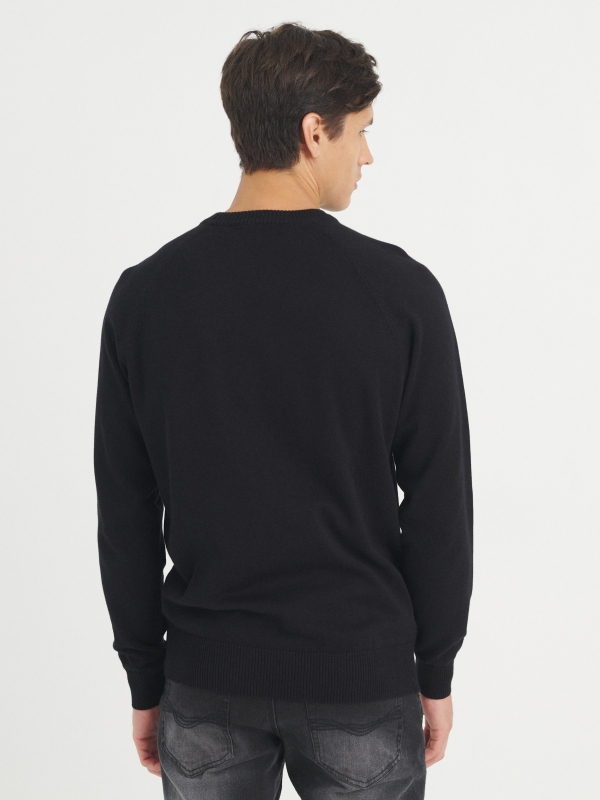 Plain sweater round neck black middle back view
