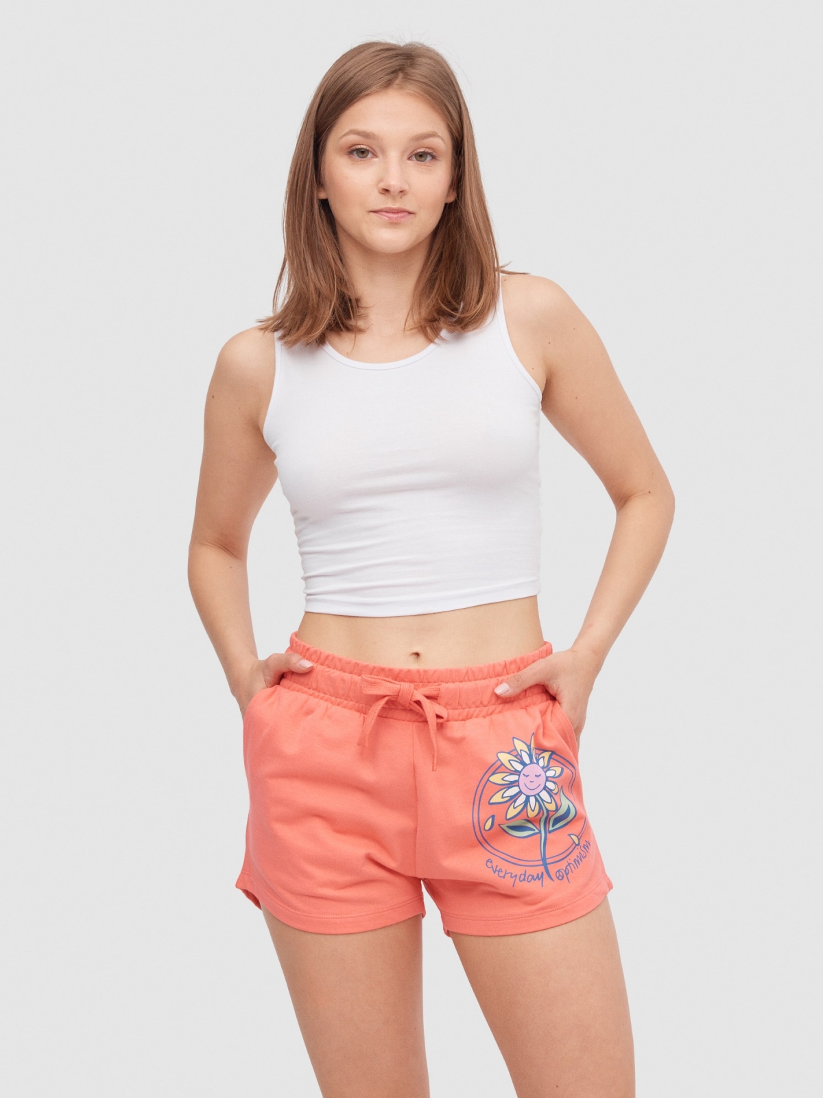 Knitted shorts with flower coral middle front view