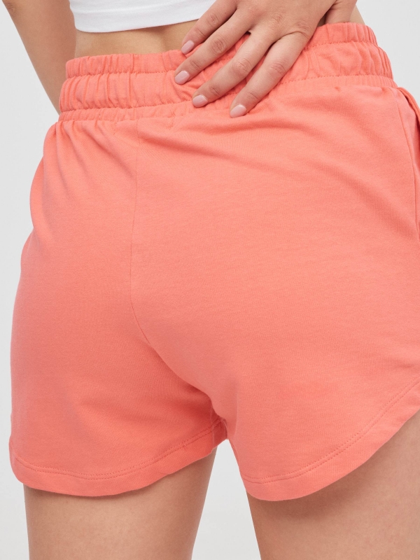 Knitted shorts with flower coral detail view