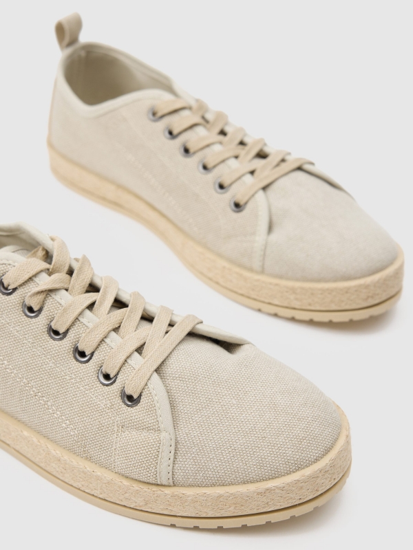 Espadrille style sneaker sand detail view