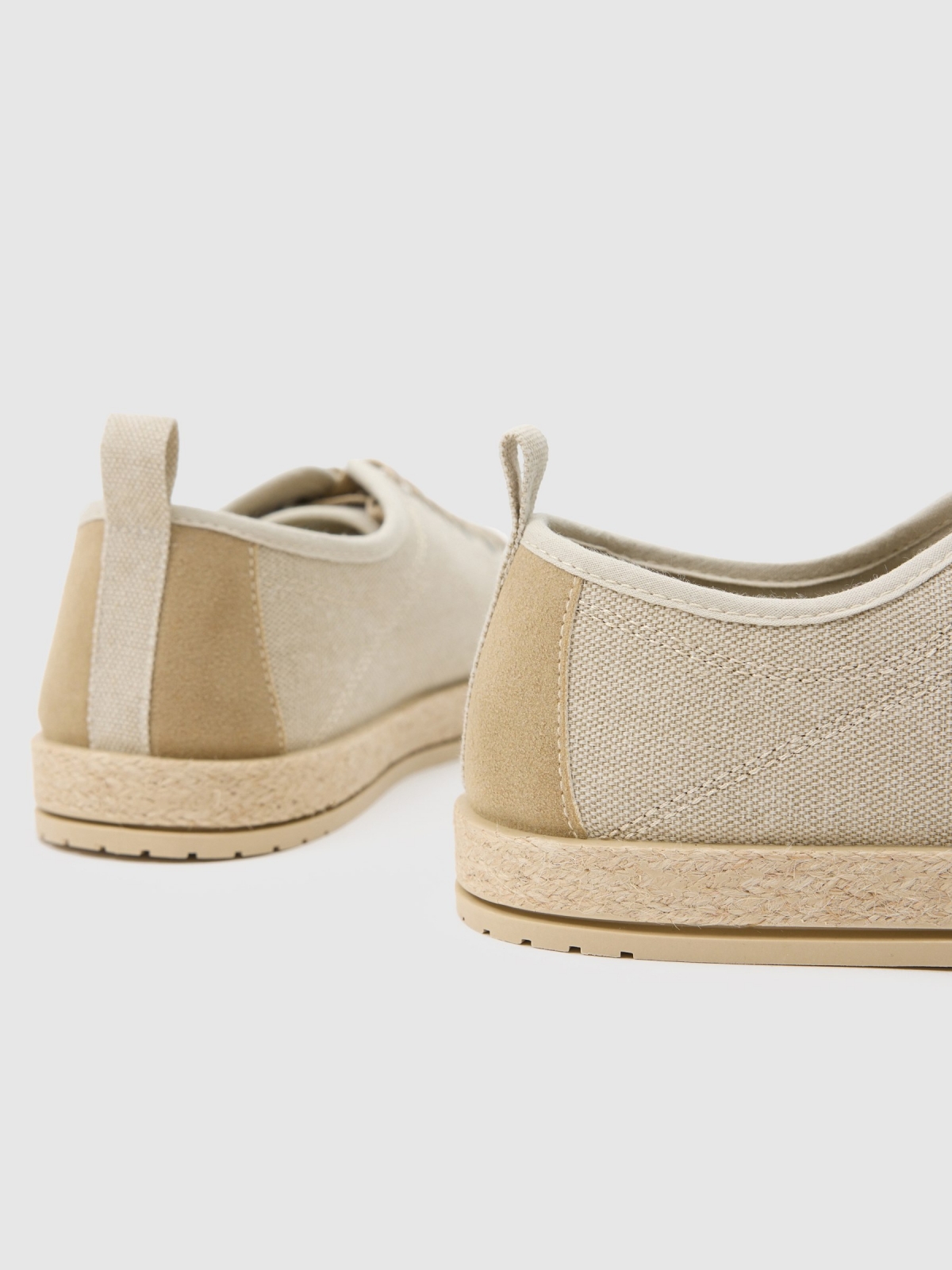 Espadrille style sneaker sand detail view