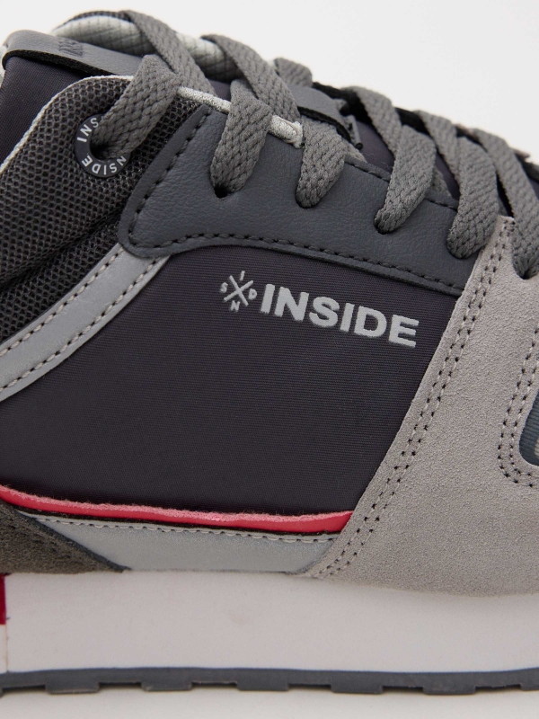 Sneaker with tricolor sole detail view