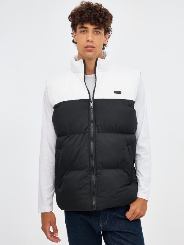 White block color quilted vest black middle front view