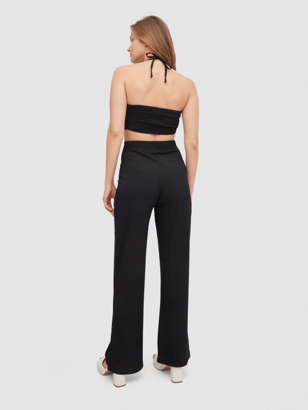 Halter jumpsuit knotted neck black middle front view