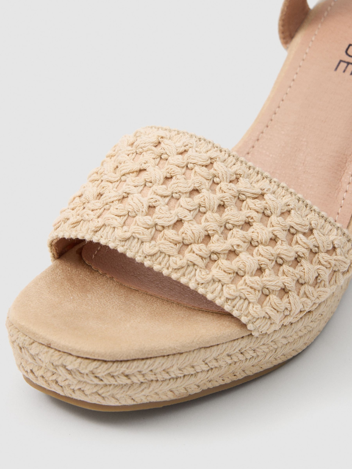 Crochet wedge sandal sand detail view