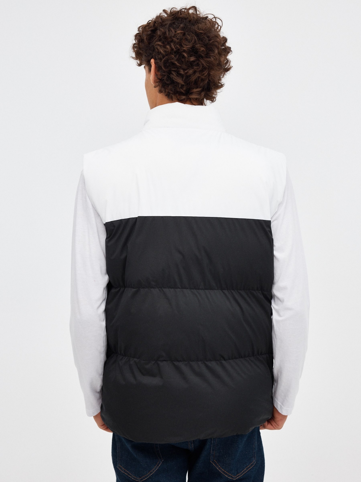 White block color quilted vest black middle back view