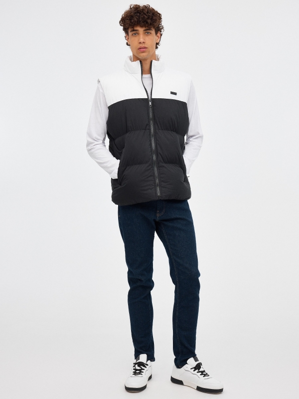 White block color quilted vest black front view