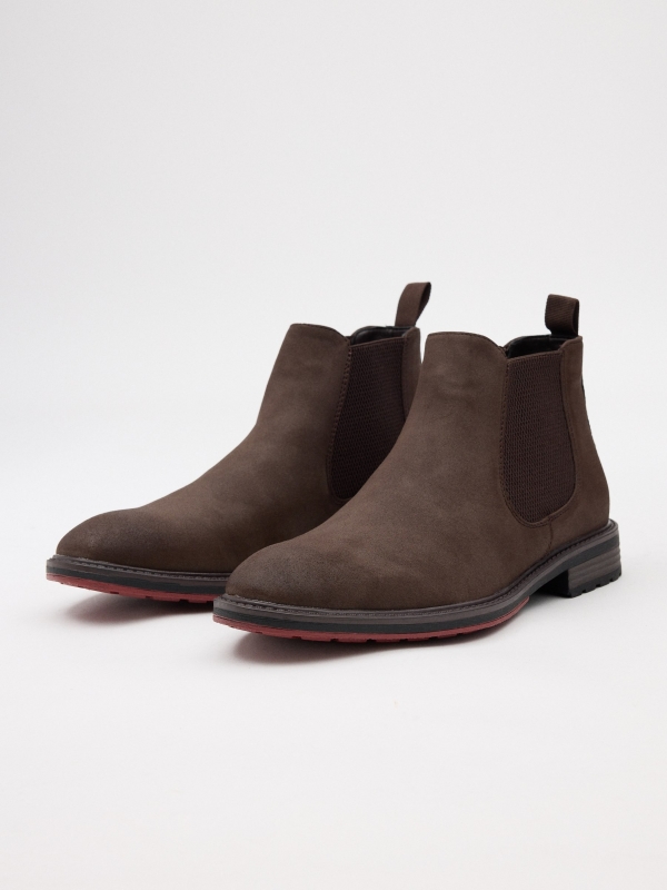 Classic ankle boots with elastic dark brown 45º front view