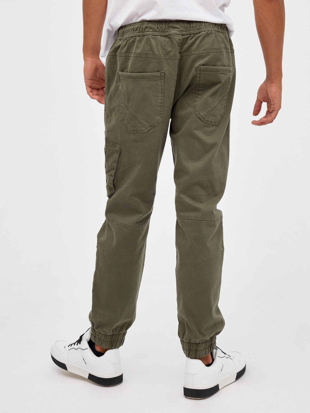 Closed pocket jogger pants green middle back view