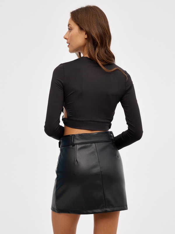 Faux leather skirt with buckle belt black middle back view
