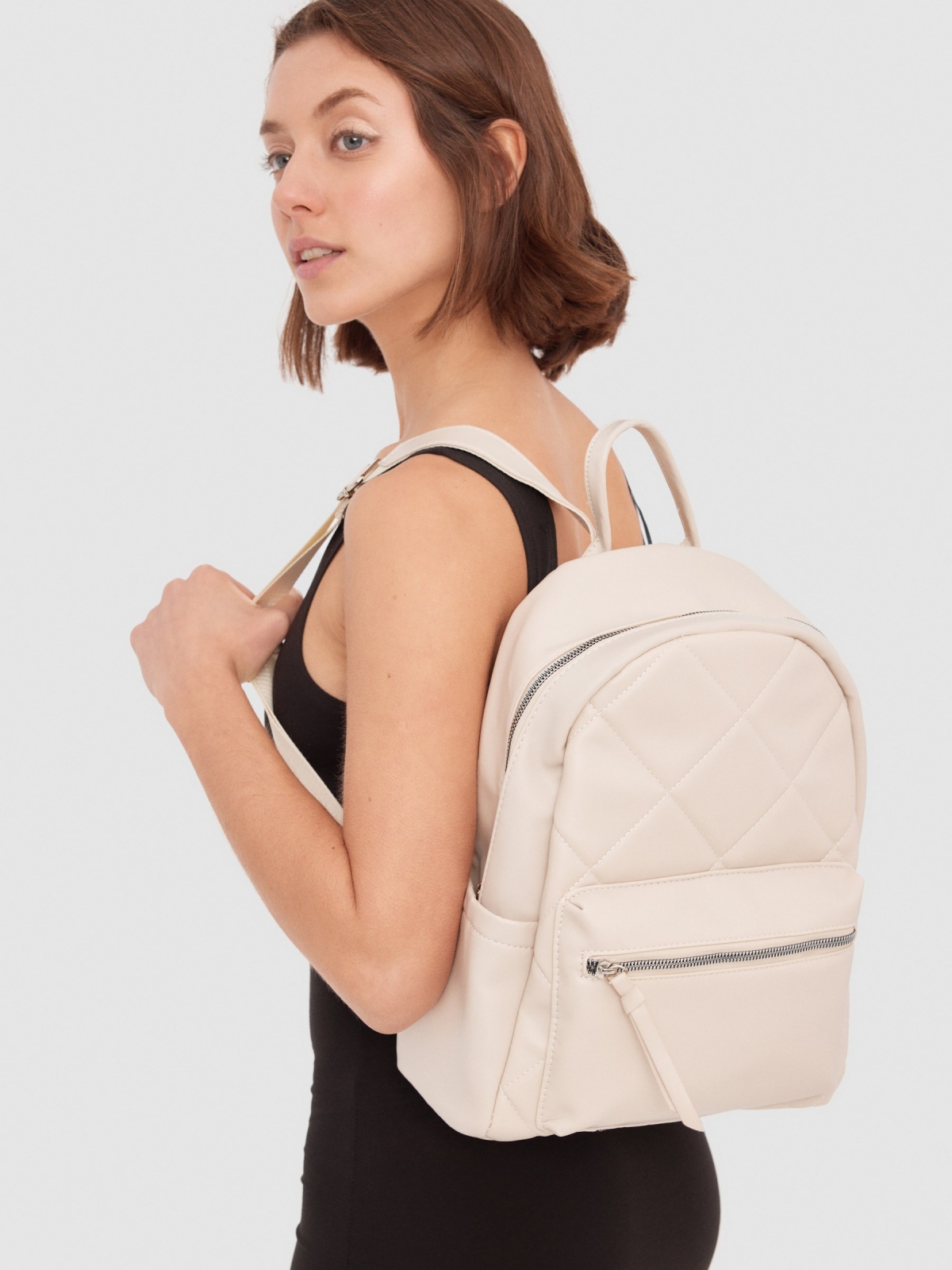Leatherette backpack white with a model