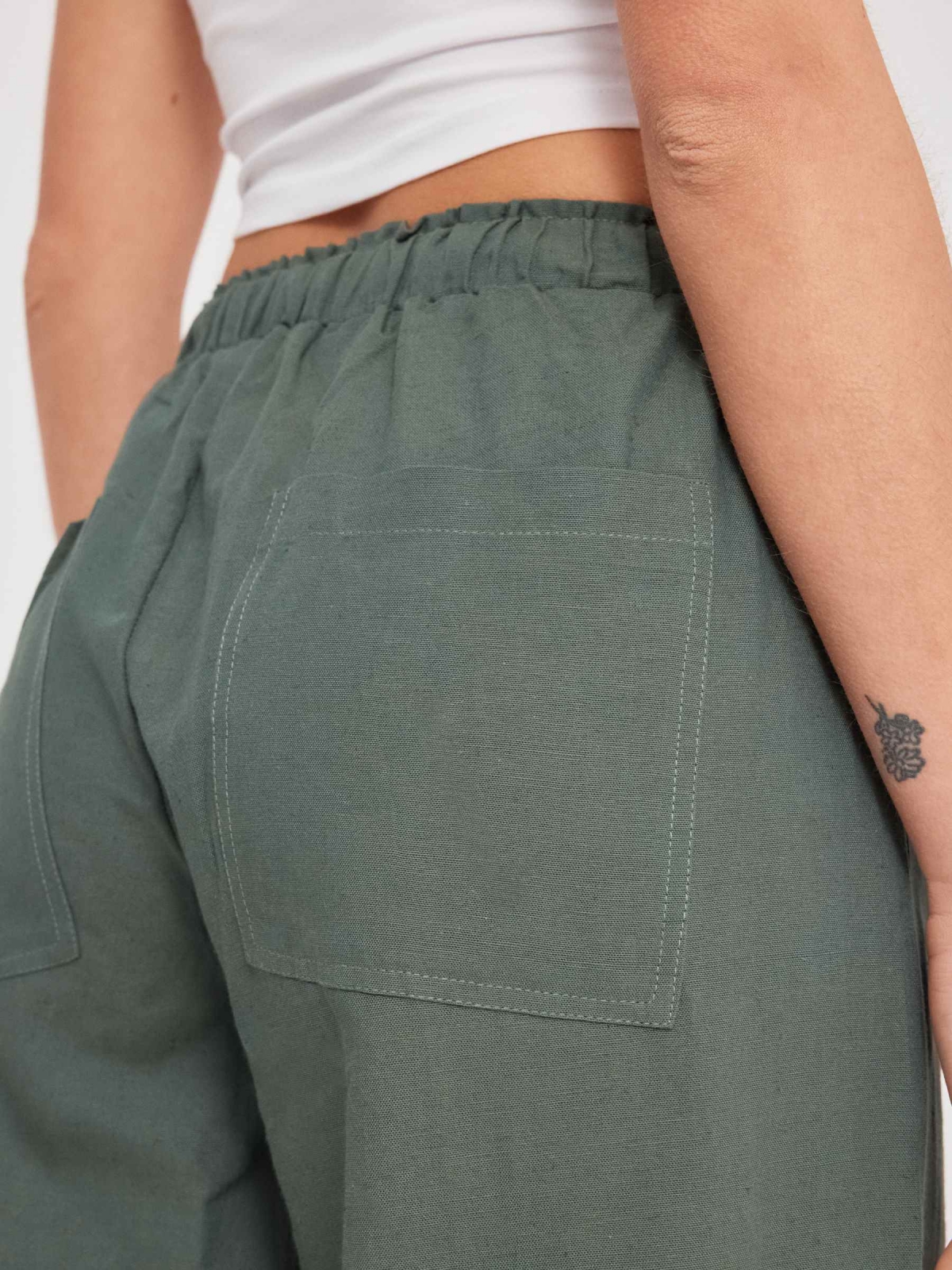 Wide-leg linen pants dark green detail view