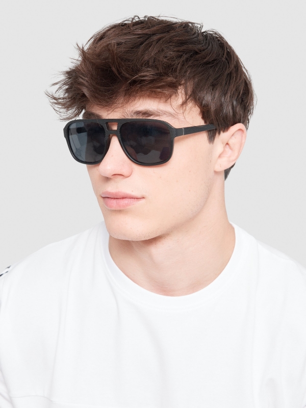 Aviator sunglasses black with a model