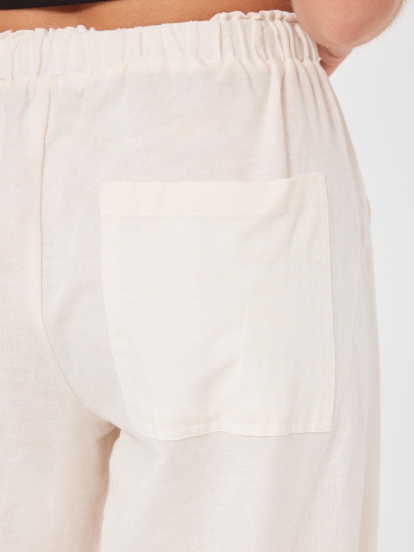 Wide-leg linen pants sand detail view