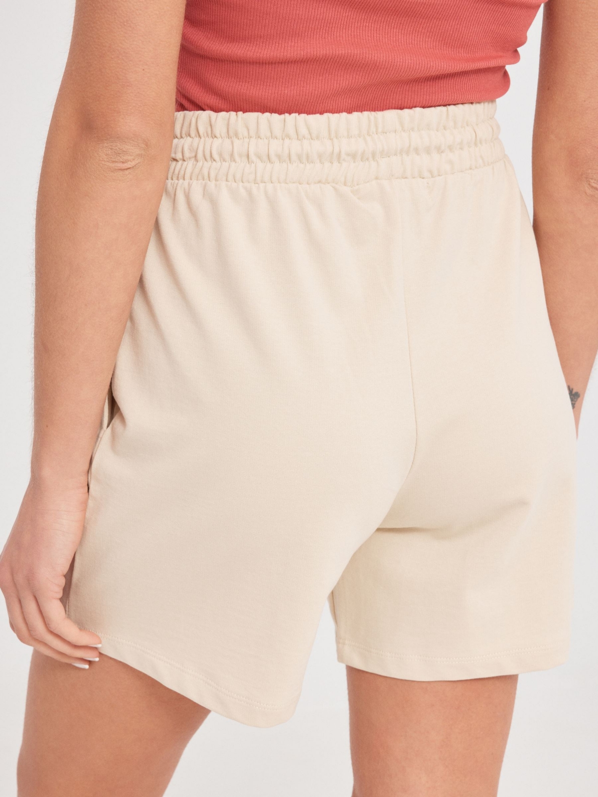 Graphic knitted shorts sand detail view