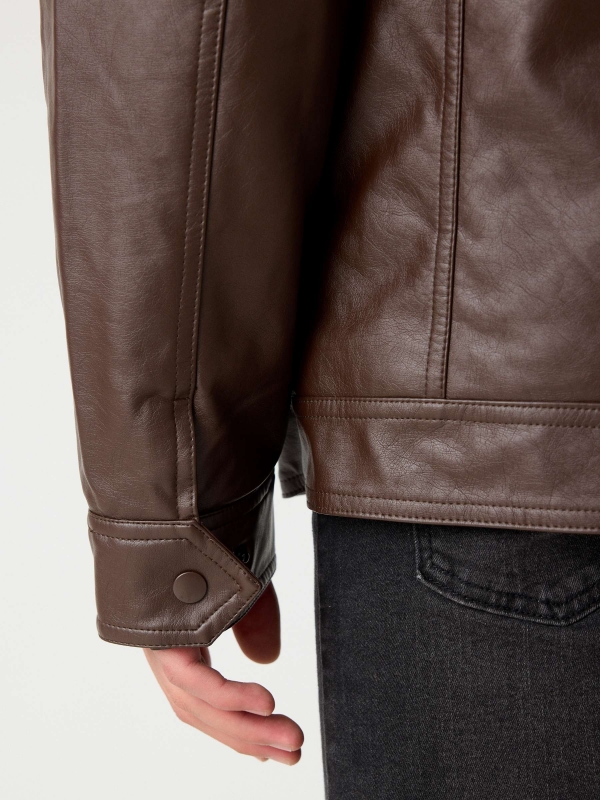 Hooded fur effect jacket with sheepskin hood brown detail view