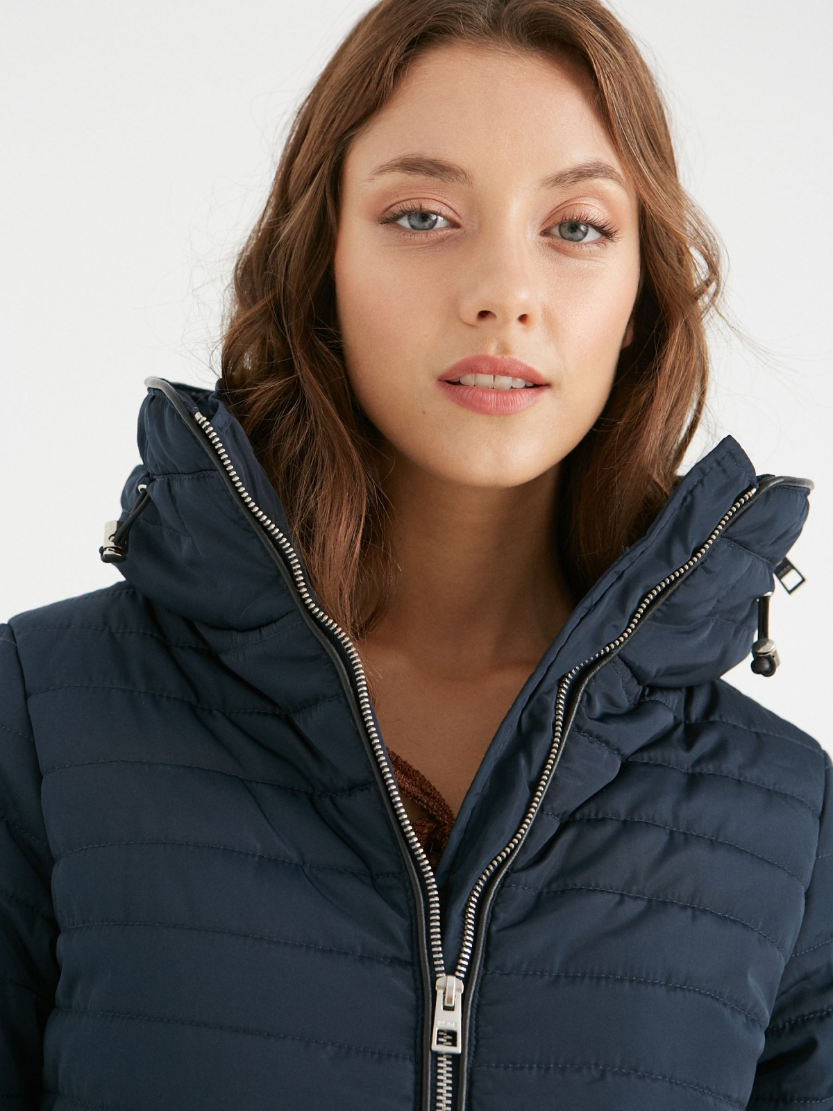 Quilted coat with hood blue detail view