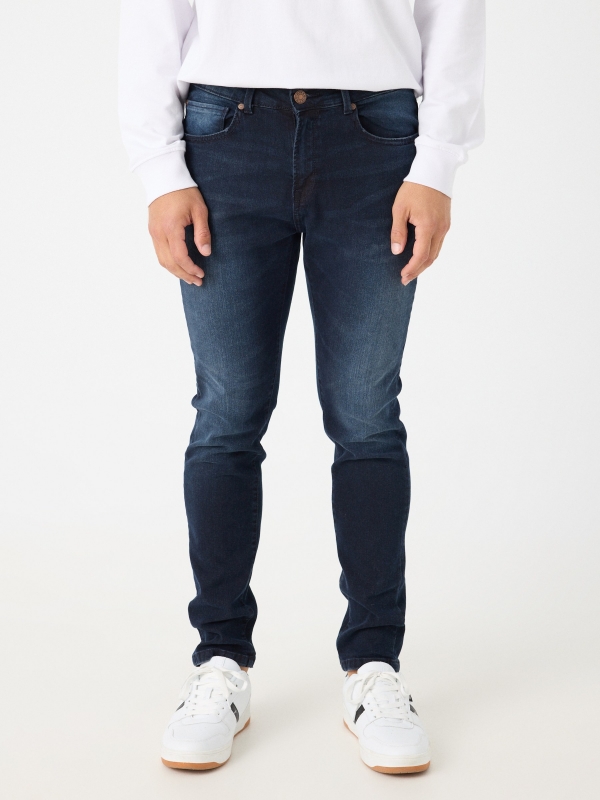 Dark slim jeans blue middle front view