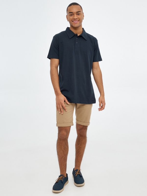 Bermuda short with five pockets beige front view
