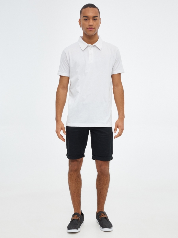 Bermuda short with five pockets black front view