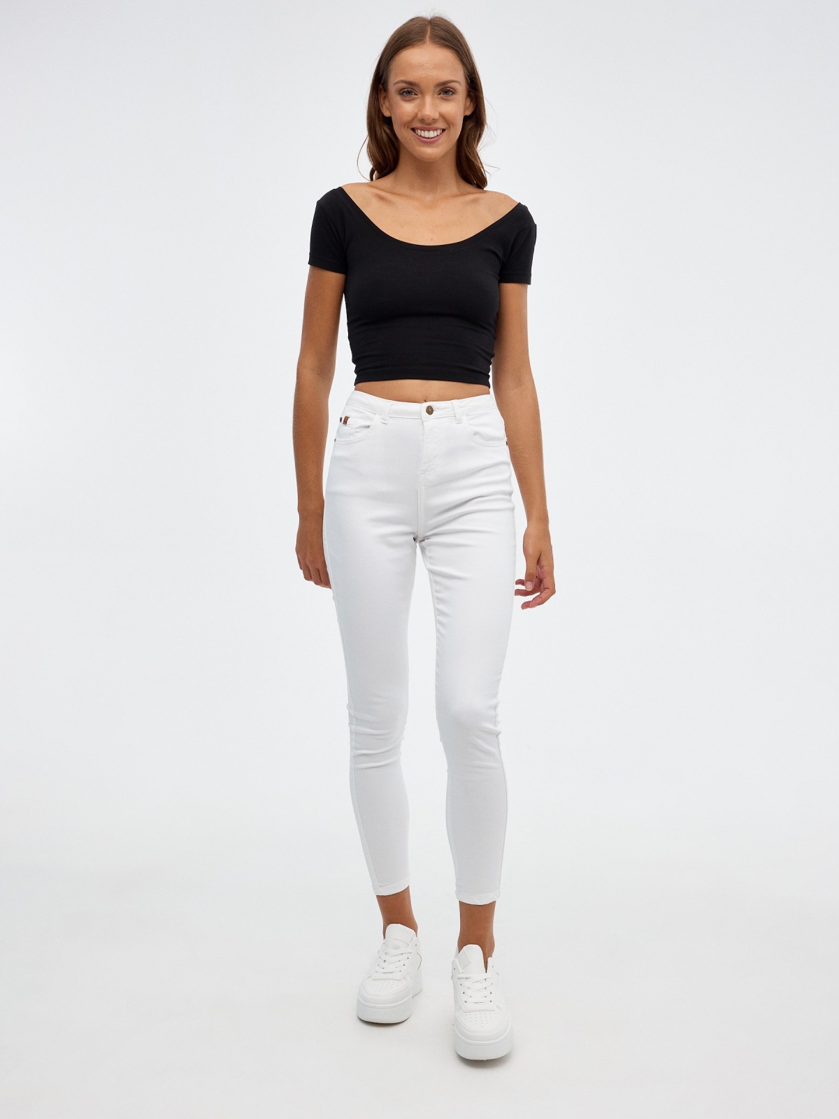 High rise skinny pants white front view