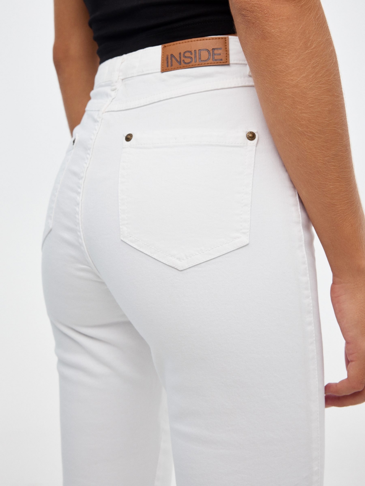 High rise skinny pants white detail view