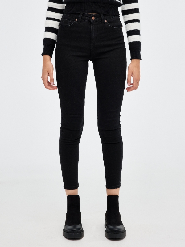 Black push up skinny jeans black middle back view