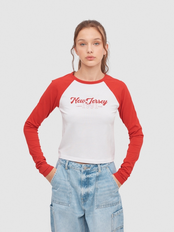 Long sleeve raglan crop top with graphics carmine middle front view