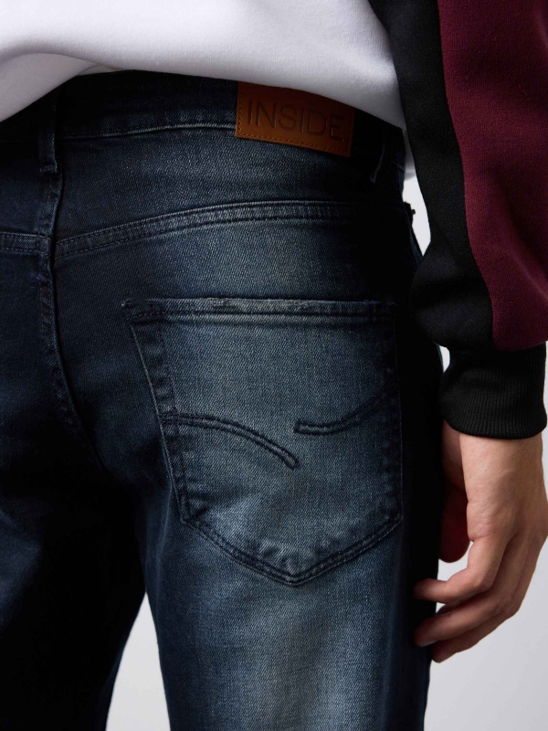 Dark slim jeans blue detail view