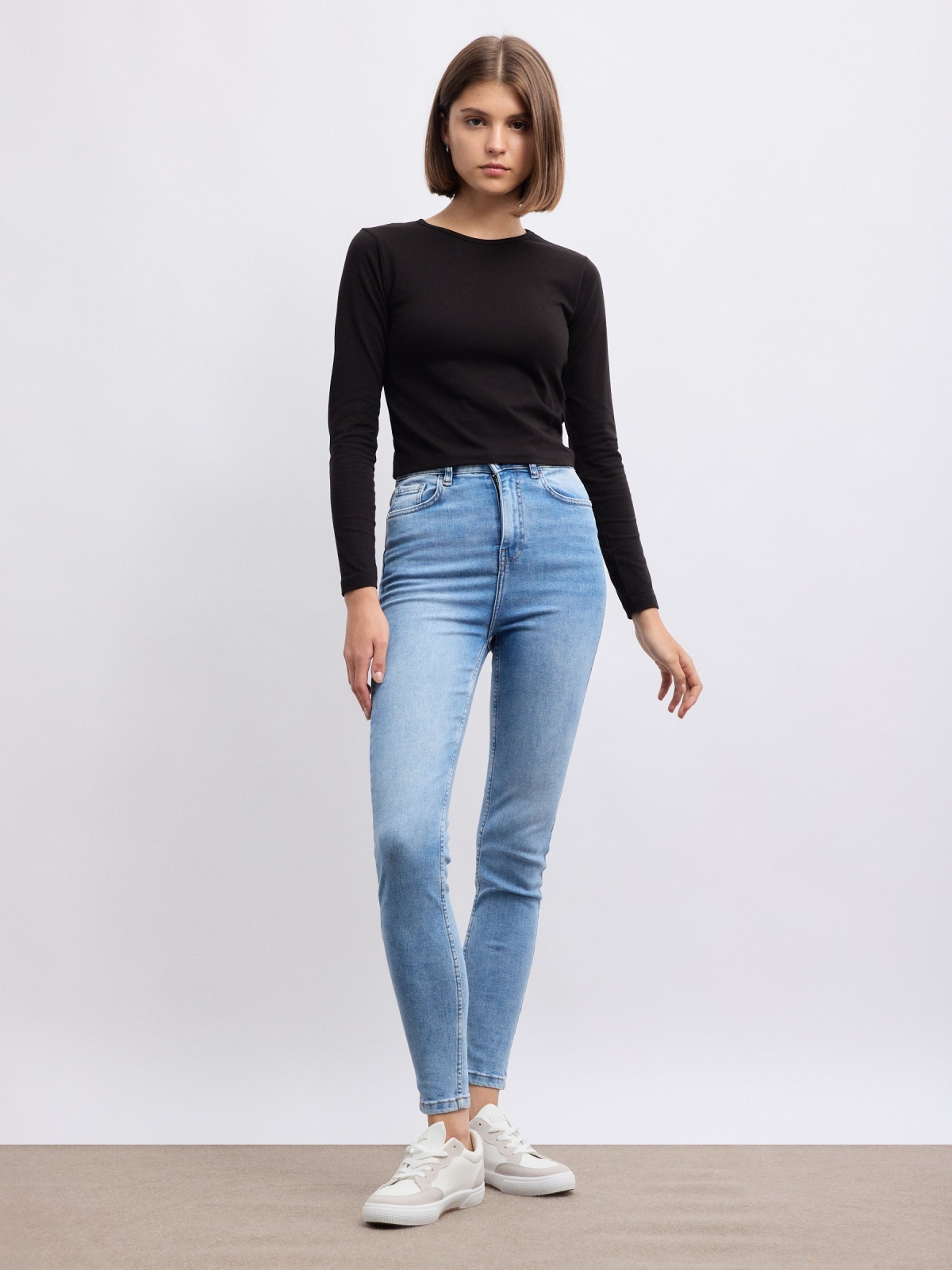 Denim skinny jeans high rise blue front view