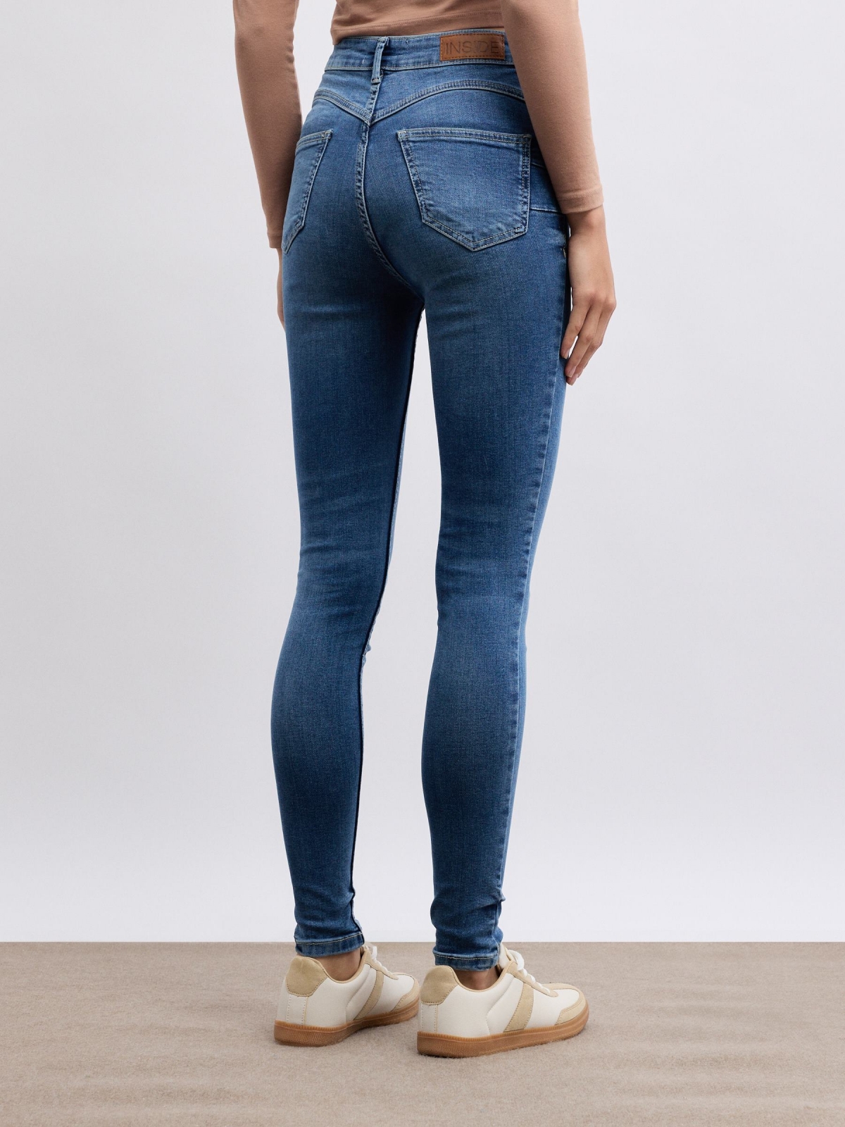 Skinny push up jeans blue middle back view