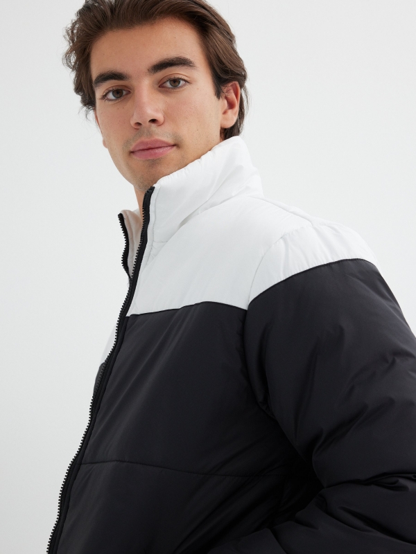 Block color quilted jacket black detail view