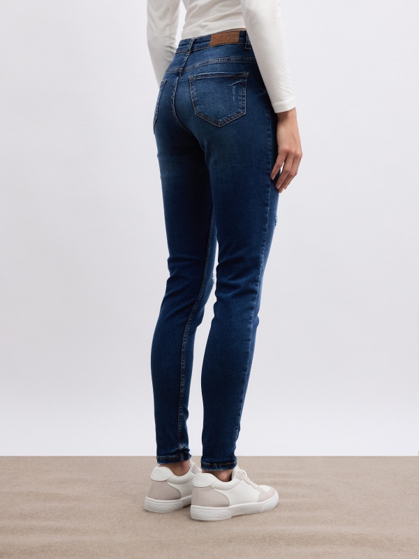 Jeans skinny tiro medio azul vista media trasera