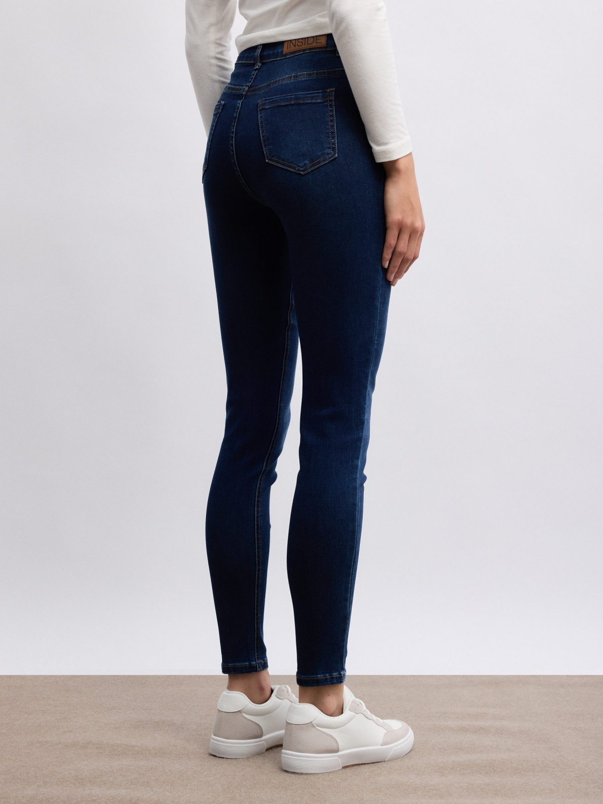 Basic mid-rise jeans dark blue middle back view