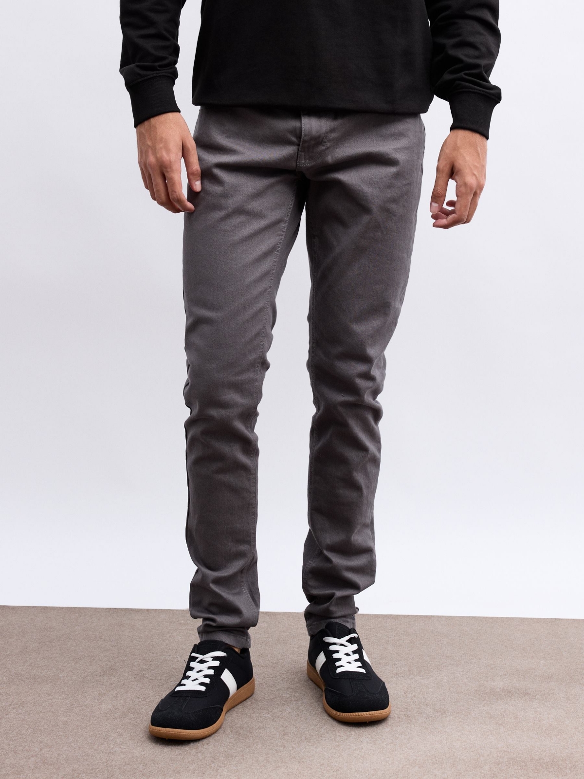 Coloured slim jeans grey middle front view