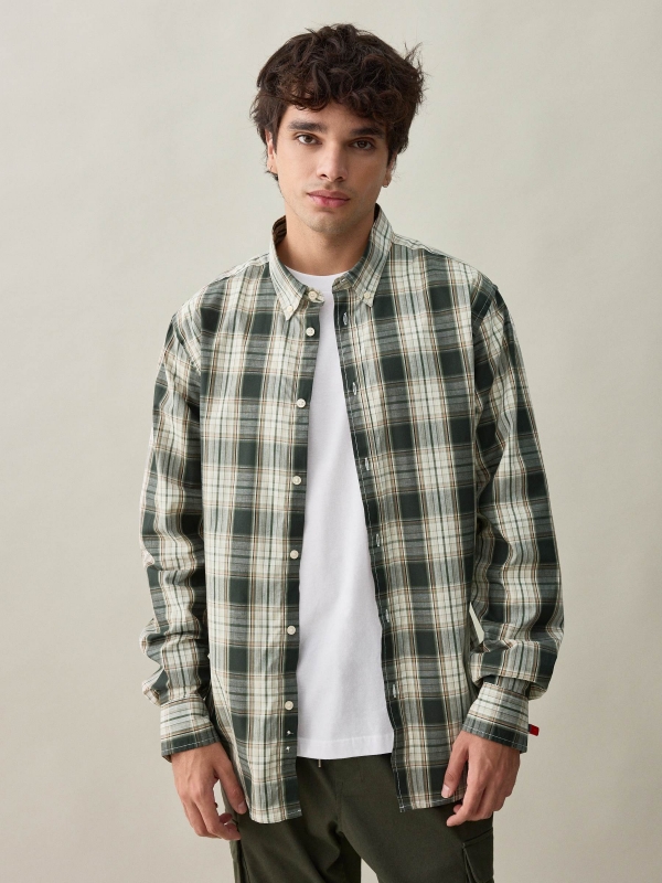 Green checkered shirt beige middle front view