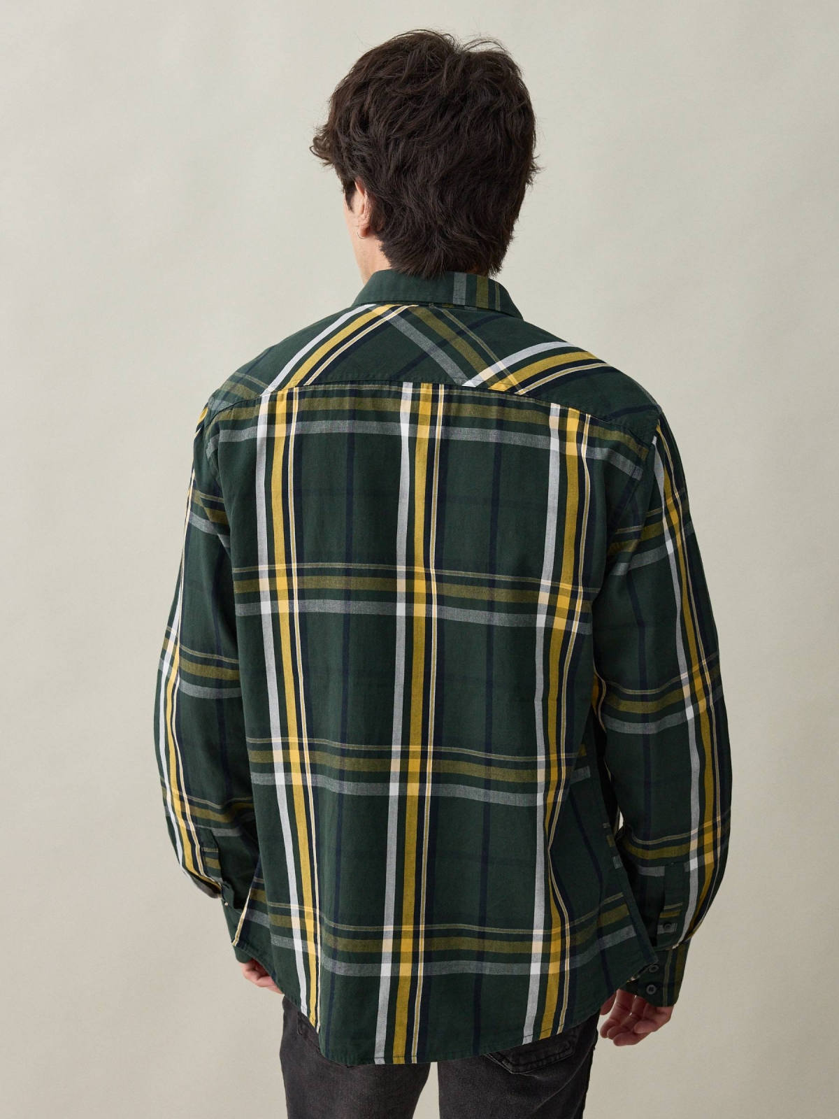 Green checked print shirt dark green middle back view