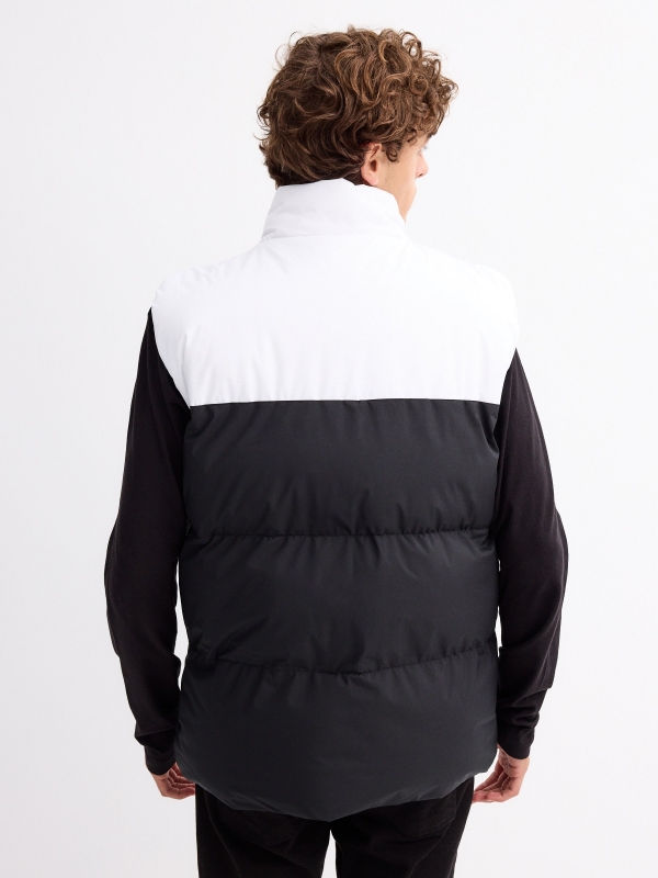 White block color quilted vest black middle back view