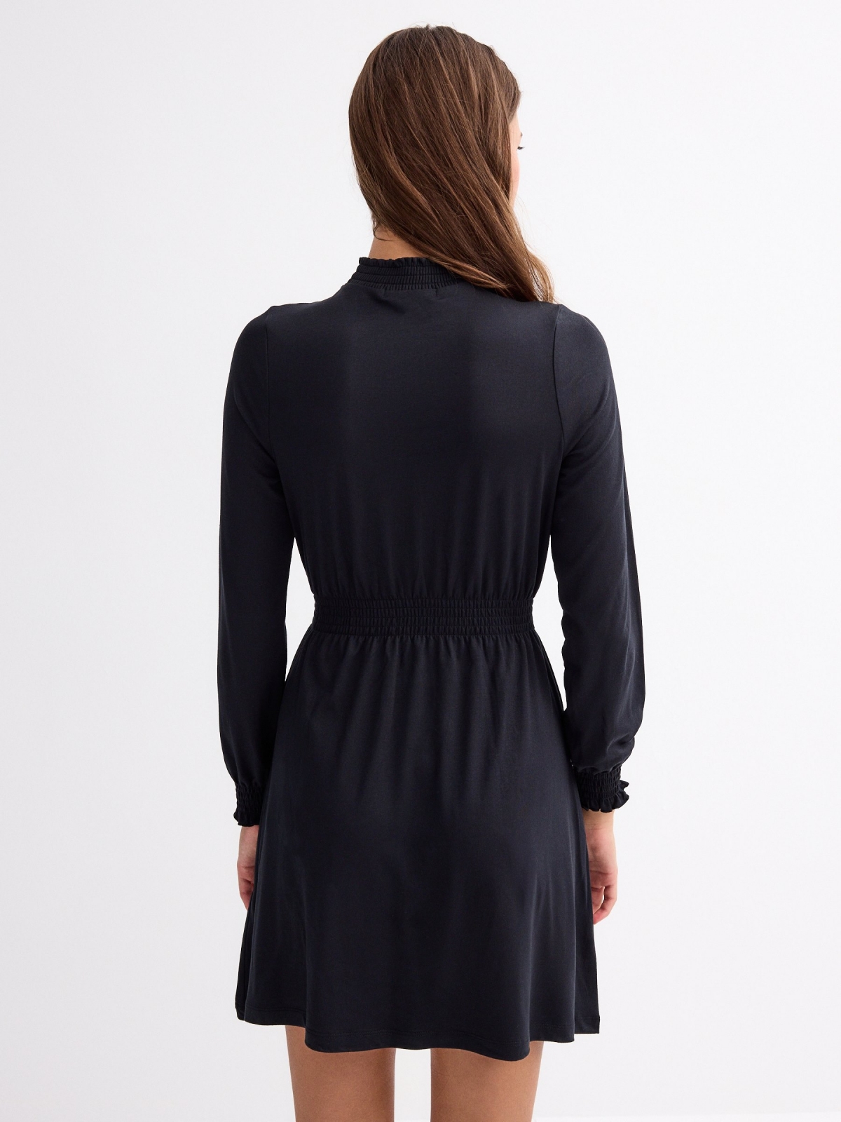 Long sleeve mini dress with floral print black middle back view