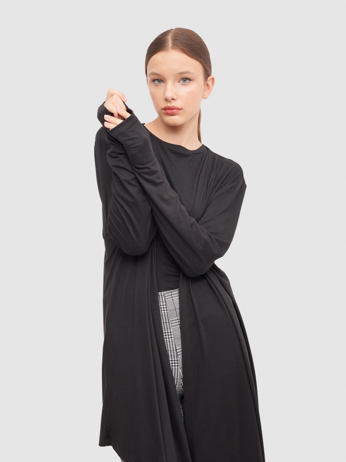 Gray asymmetrical flowing knitted cardigan black detail view