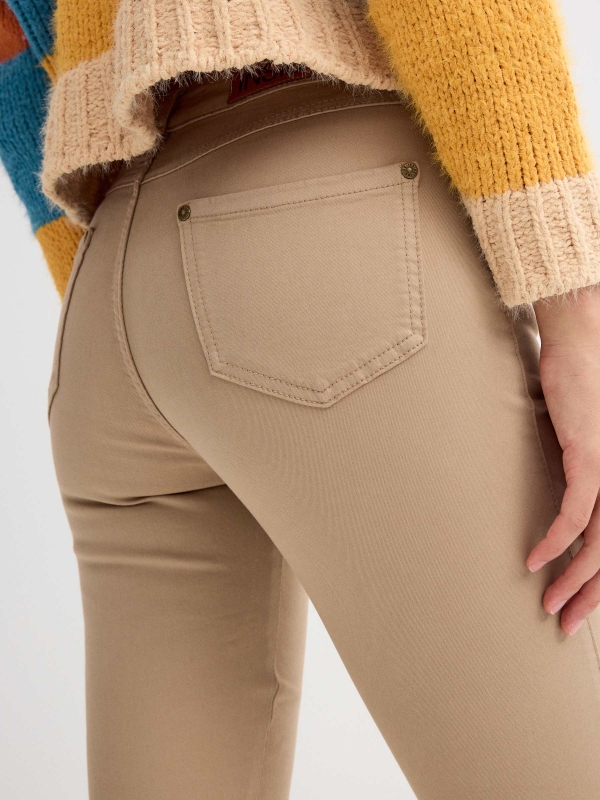 Plain colour skinny beige detail view