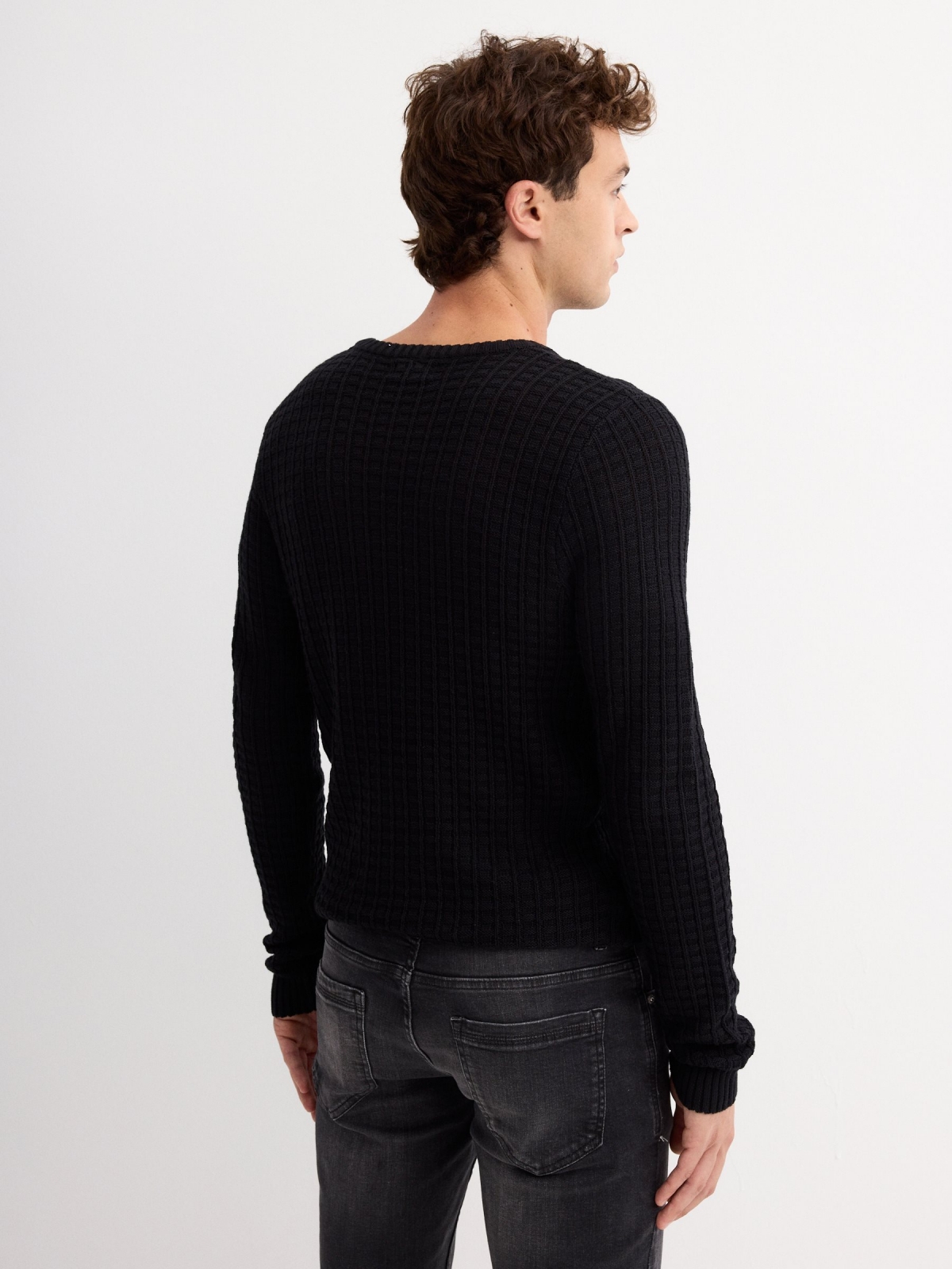 Textured knitted sweater black middle back view