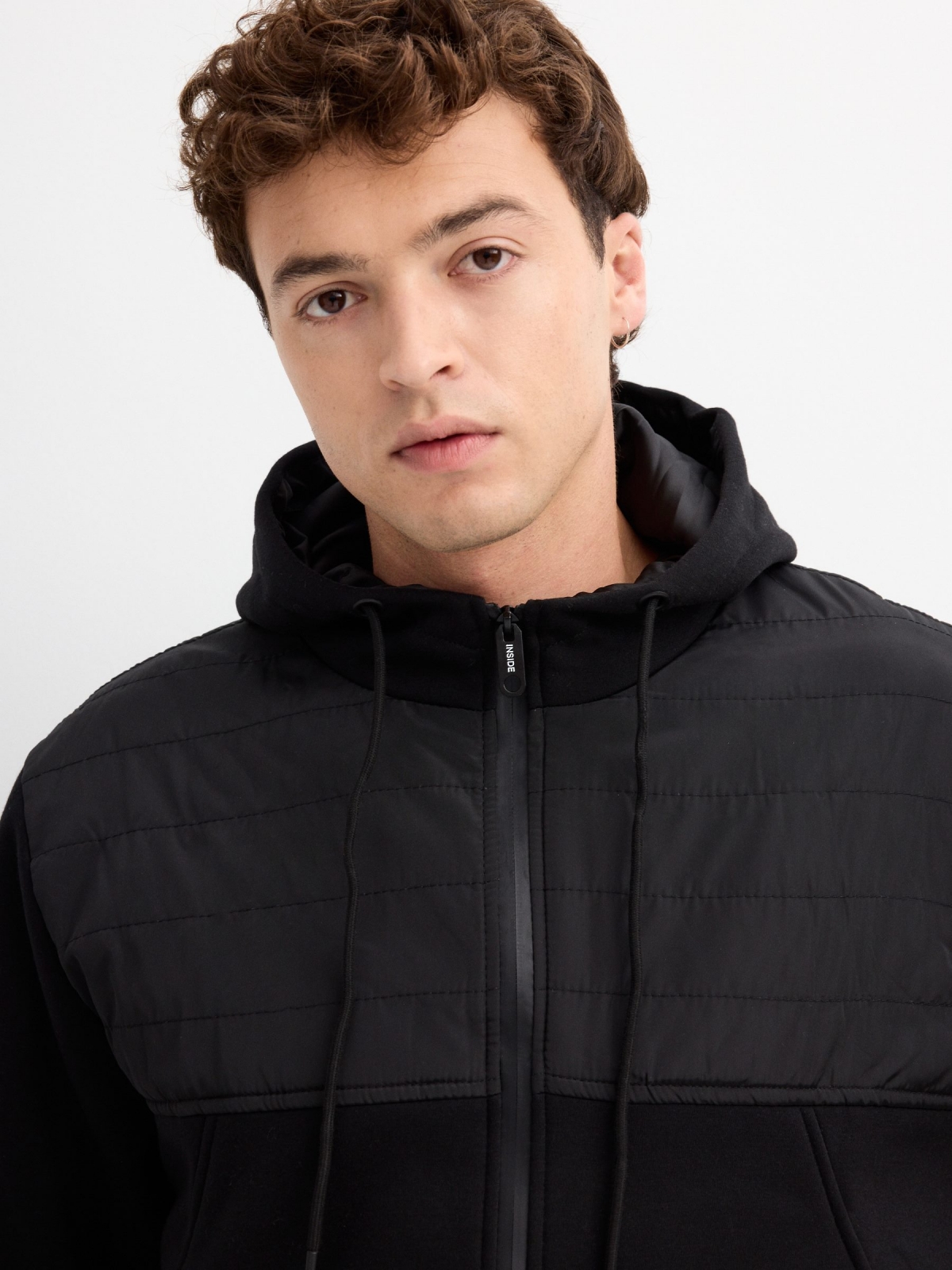 Combined hooded jacket black detail view