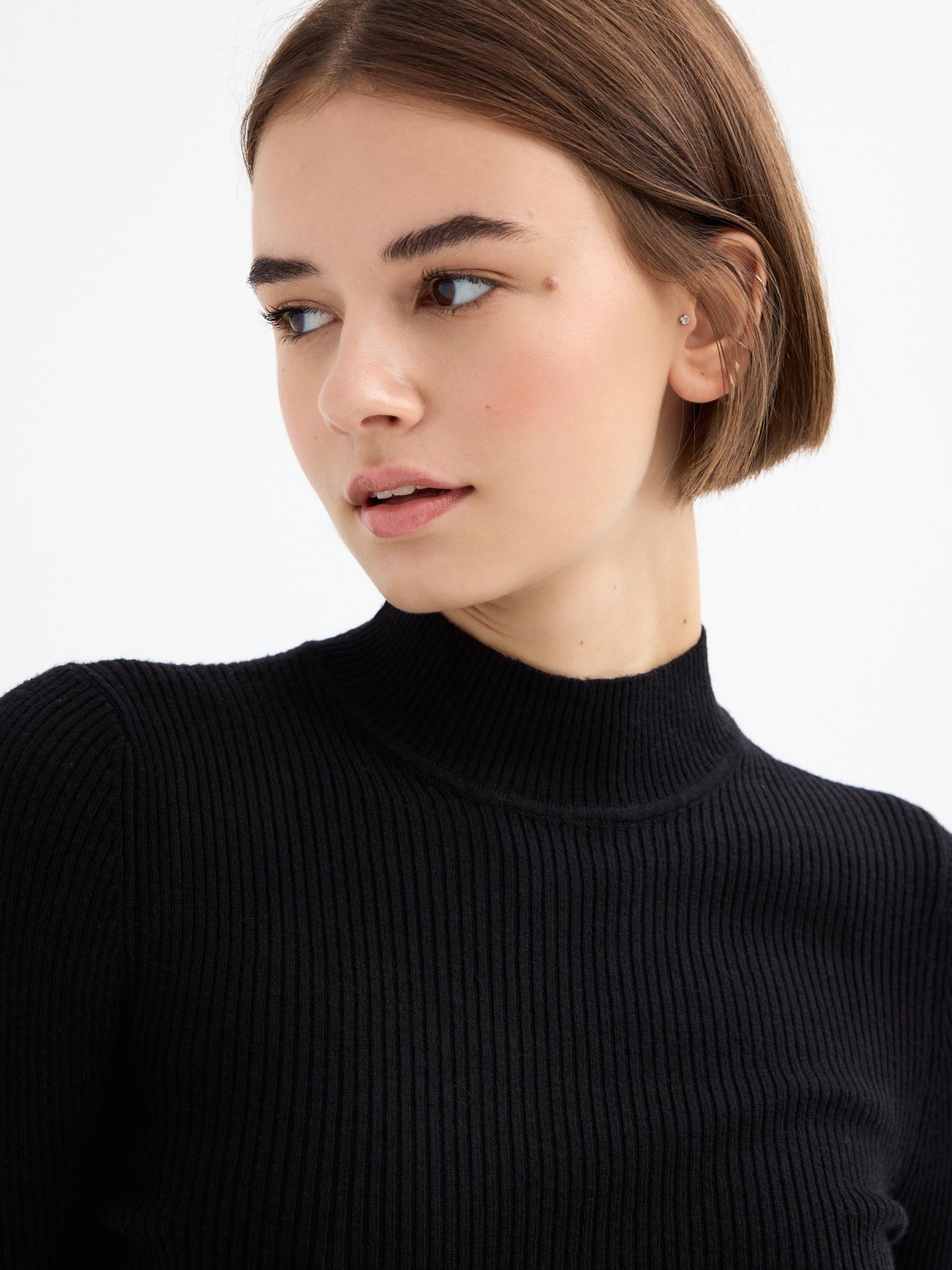 Black sweater with turtleneck black detail view