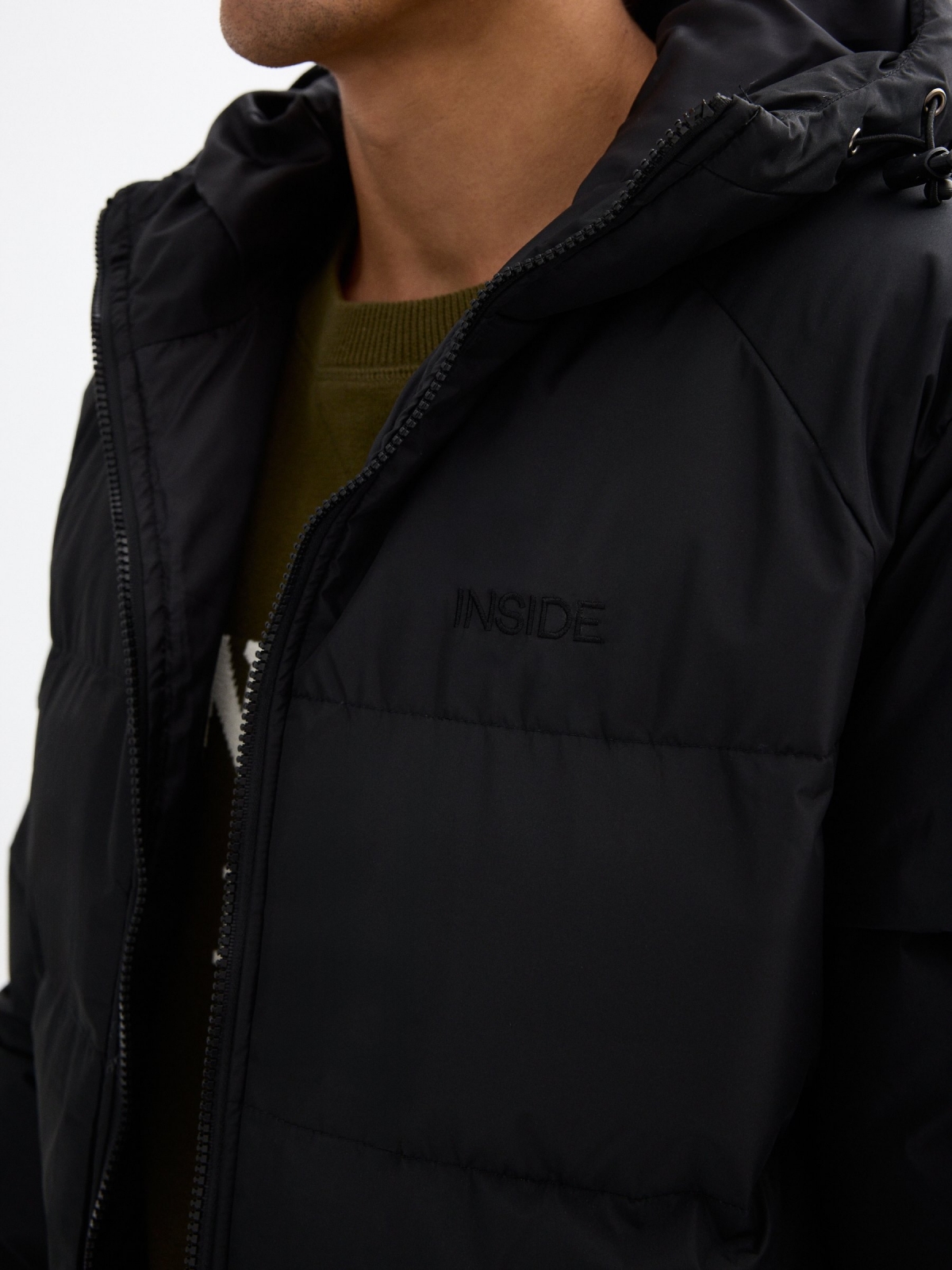 Black hooded quilted jacket with black hood black detail view