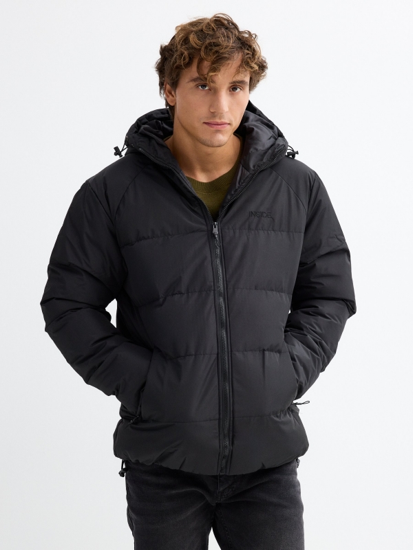 Black hooded quilted jacket with black hood black detail view