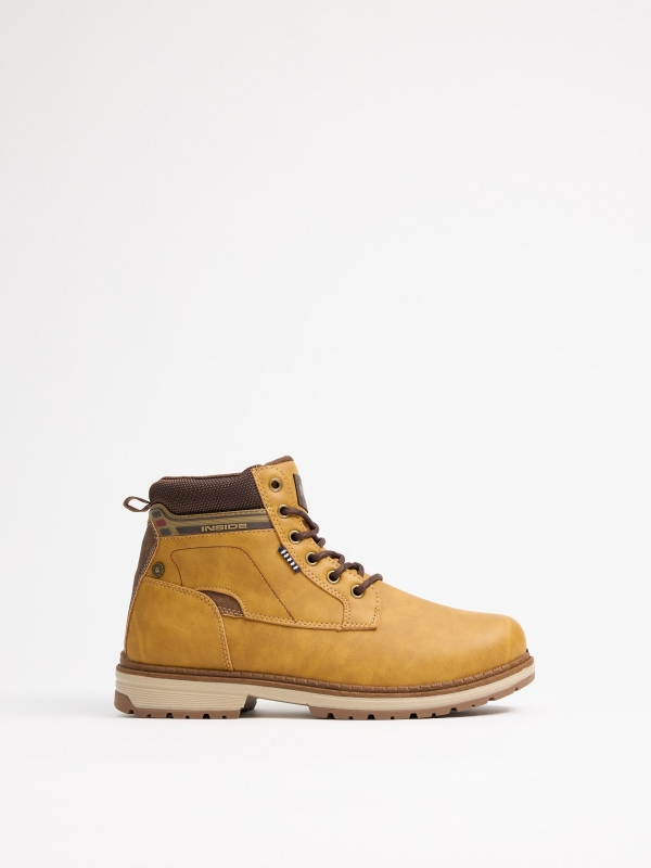 Mustard mountaineering boot with track sole yellow profile view