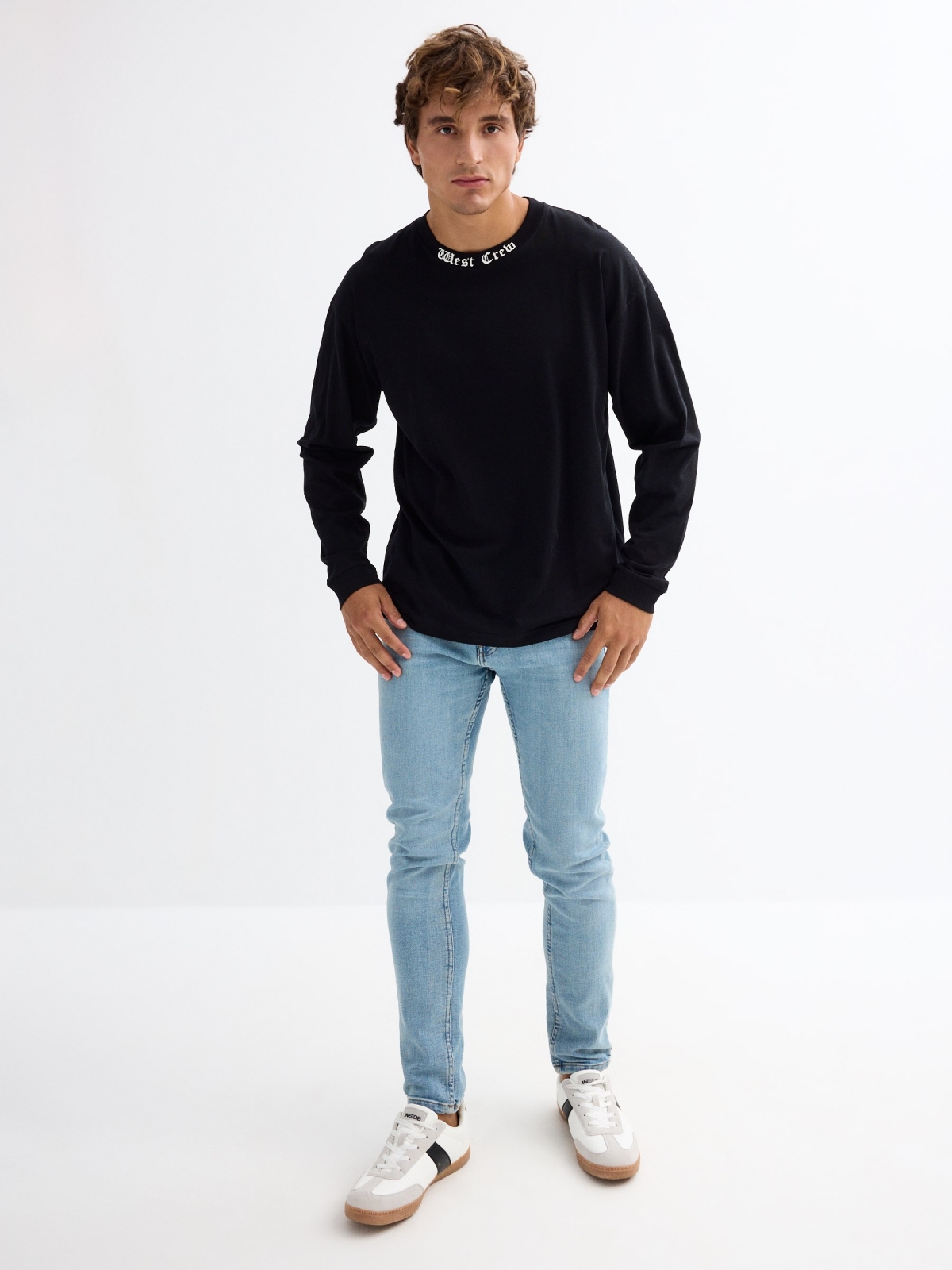 Long sleeve black t-shirt with graphic black general front view