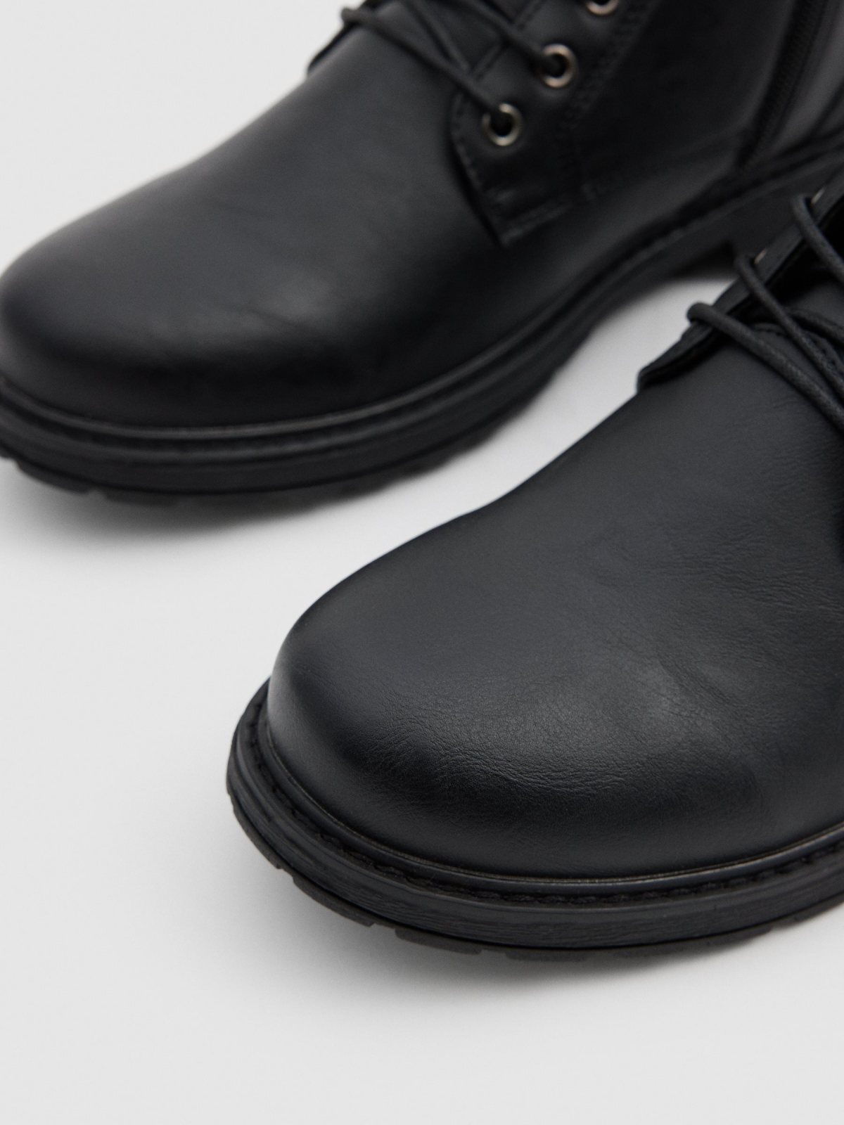 Black leather effect ankle boots black detail view