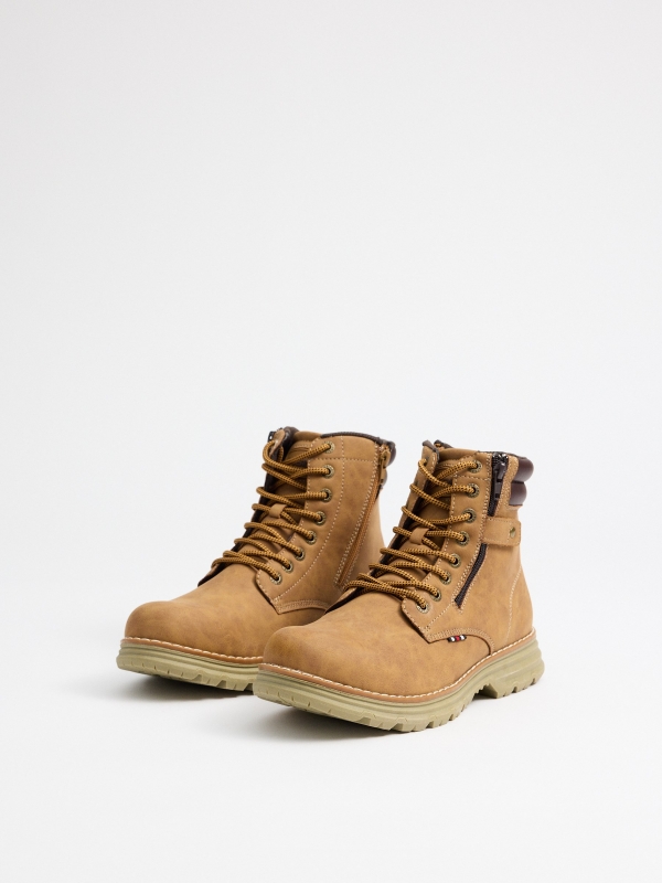 Mustard mountaineering boot yellow 45º front view